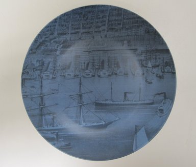 Susan Doban (American, born 1958). <em>Plate "The City of Brooklyn- Brooklyn Waterfront below Brooklyn Bridge,"</em> Designed and manufactured 2010. Porcelain, 7/8 × 8 3/8 in. (2.2 × 21.3 cm). Brooklyn Museum, Gift of Susan Doban for Think Fabricate, 2010.30.1. Creative Commons-BY (Photo: Brooklyn Museum, CUR.2010.30.1.jpg)