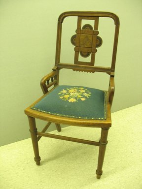 Peter Diehl (American, 2nd half 19th century). <em>Armchair</em>, Patented April 17, 1877. Wood, later needle point upholstery, upholstery tacks, 36 1/4 x 19 1/4 x 21 1/4 in. (92.1 x 48.9 x 54 cm). Brooklyn Museum, Gift of the Thornside Collection, 2010.50. Creative Commons-BY (Photo: Brooklyn Museum, CUR.2010.50.jpg)