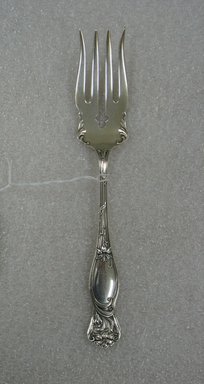 1847 Rogers Brothers (Division of Rogers Brothers). <em>Serving Fork, Daffodil Pattern</em>, ca. 1905. Silverplate, 8 x 1 3/8 x 1 in. (20.3 x 3.5 x 2.5 cm). Brooklyn Museum, Gift of William Lee Younger in memory of Joseph A. Henehan, 2010.77.17. Creative Commons-BY (Photo: Brooklyn Museum, CUR.2010.77.17_front.jpg)