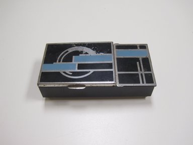  <em>Cigarette Box</em>, ca. 1930. White metal, pigment, wood, glass, 1 1/2 x 5 3/8 x 2 7/8 in. (3.8 x 13.7 x 7.3 cm). Brooklyn Museum, Gift of Arnold Lehman, 2011.15.2. Creative Commons-BY (Photo: Brooklyn Museum, CUR.2011.15.2_exterior.jpg)