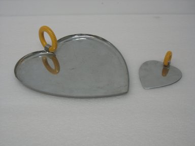 Chase Brass & Copper Co., Inc. (founded 1876-present). <em>"Valentine Serving Set" Tray, Model No. 09020</em>, ca. 1935. Chromed metal, plastic, 2 3/4 x 10 1/8 x 11 1/8 in. (7.0 x 25.7 x 28.3 cm). Brooklyn Museum, Gift of Arnold Lehman, 2011.15.5. Creative Commons-BY (Photo: Brooklyn Museum, CUR.2011.15.5.jpg)