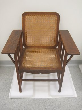 David Wolcott Kendall (American, 1851–1910). <em>Armchair</em>, designed 1894; manufactured 1894–ca.1915. Oak, cane, 34 1/2 x 24 x 23 5/8 in. (87.6 x 61 x 60 cm). Brooklyn Museum, Gift of Maureen Cassidy-Geiger, James and Lily Geiger, 2011.42. Creative Commons-BY (Photo: Brooklyn Museum, CUR.2011.42.jpg)