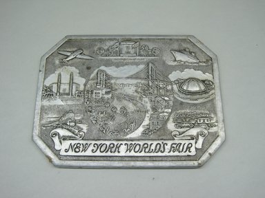 Sayford Company. <em>"Hot Plate, New York World's Fair,"</em> ca. 1939. Metallic paper, other paper, 1/4 x 8 1/8 x 6 in. (0.6 x 20.6 x 15.2 cm). Brooklyn Museum, Gift of Linda S. Ferber, 2011.43.1. Creative Commons-BY (Photo: Brooklyn Museum, CUR.2011.43.1.jpg)