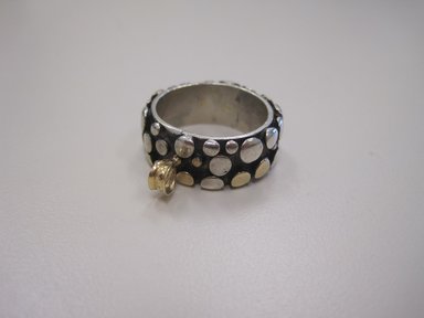 Art Smith (American, born Cuba, 1917-1982). <em>Man's Wedding Ring</em>, 1974. Gold and Sterling Silver., 3/8 x 1 in. (1 x 2.5 cm). Brooklyn Museum, Gift of Linda Kandel Kuehl in loving memory of her husband, John R. Kuehl, 2011.89.3. Creative Commons-BY (Photo: Brooklyn Museum, CUR.2011.89.3.jpg)