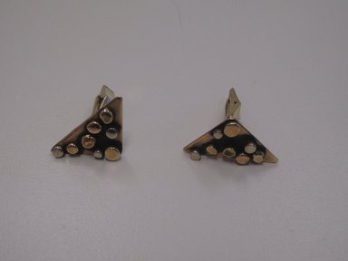 Art Smith (American, born Cuba, 1917-1982). <em>Pair of Cuff Links</em>, 1974. Gold and silver, 1 x 1 x 1/2 in. (2.5 x 2.5 x 1.3 cm). Brooklyn Museum, Gift of Linda Kandel Kuehl in loving memory of her husband, John R. Kuehl, 2011.89.4a-b. Creative Commons-BY (Photo: Brooklyn Museum, CUR.2011.89.4a-b_view1.jpg)