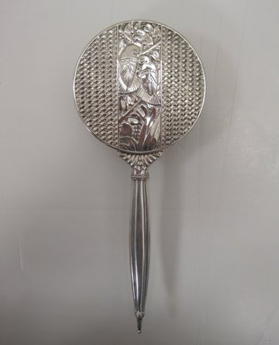 Napier (1922-present). <em>Hair Brush</em>, ca. 1928. Silver, wood, natural bristles, 9 3/4 x 3 7/8 x 1 1/2 in. (24.8 x 9.8 x 3.8 cm). Brooklyn Museum, Gift of Max Moglen, by exchange, 2012.9. Creative Commons-BY (Photo: Brooklyn Museum, CUR.2012.9_view1.jpg)