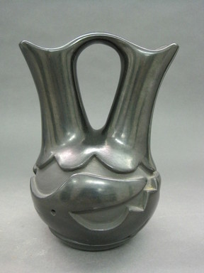 Madeline Naranjo (Kah’p’oo Owinge (Santa Clara Pueblo), 1916-2020). <em>Blackware Wedding Vase</em>, 1970s. Clay, pigment, 8 1/2 x 6 1/2 in. (21.6 x 16.5 cm). Brooklyn Museum, Gift of Joan and Sanford Krotenberg, 2013.64.1. Creative Commons-BY (Photo: Brooklyn Museum, CUR.2013.64.1_view1.jpg)