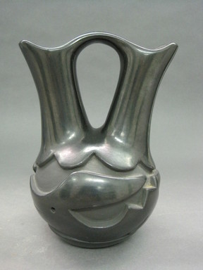 Madeline Naranjo (Kah’p’oo Owinge (Santa Clara Pueblo), 1916–2020). <em>Blackware Wedding Vase</em>, 1970s. Clay, pigment, 8 1/2 x 6 1/2 in. (21.6 x 16.5 cm). Brooklyn Museum, Gift of Joan and Sanford Krotenberg, 2013.64.1. Creative Commons-BY (Photo: Brooklyn Museum, CUR.2013.64.1_view1.jpg)