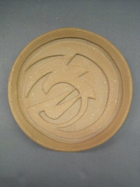 Carmel Romero (Kah’p’oo Owinge (Santa Clara Pueblo)). <em>Dish</em>, ca. 1970. Clay, 1/2 x 7 5/8 in. (1.3 x 19.4 cm). Brooklyn Museum, Gift of Joan and Sanford Krotenberg, 2013.64.7. Creative Commons-BY (Photo: Brooklyn Museum, CUR.2013.64.7.jpg)