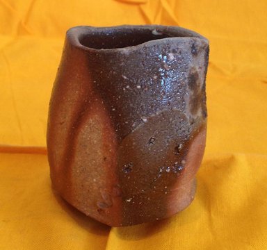 Kakurezaki Ryuichi (Japanese, born 1950). <em>Sake Cup</em>, 1995. Stoneware with some ash glaze; bizen ware, 3 1/8 x 2 3/16 in. (8 x 5.5 cm). Brooklyn Museum, Gift of Shelly and Lester Richter, 2013.83.14. Creative Commons-BY (Photo: Brooklyn Museum, CUR.2013.83.14.jpg)