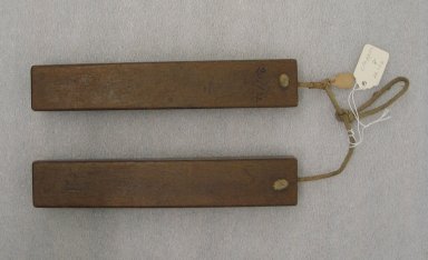  <em>Clapper(s) (Mokkim)</em>. Wood, 8 1/2 x 1 x 1 1/8 in. Brooklyn Museum, Museum Expedition 1909, Purchased with funds given by Thomas T. Barr, E. LeGrand Beers, Carll H. de Silver, Herman B. Stutzer, Colonel Robert B. Woodward and the Museum Collection Fund, 20132. Creative Commons-BY (Photo: Brooklyn Museum, CUR.20132.jpg)