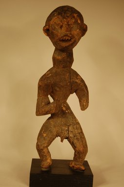 Bamileke. <em>Figure</em>, 20th century. Wood, 17 15/16 x 5 7/8 x 5 1/8 in. (45.5 x 15 x 13 cm). Brooklyn Museum, Gift in memory of Frederic Zeller, 2014.54.11 (Photo: Brooklyn Museum, CUR.2014.54.11_overall.jpg)