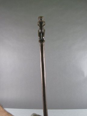 Chokwe. <em>Staff</em>, early 20th century. Wood, fiber, beads, height: 25 in. (63.5 cm). Brooklyn Museum, Gift in memory of Frederic Zeller, 2014.54.13 (Photo: Brooklyn Museum, CUR.2014.54.13_front.jpg)