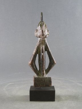 Dogon. <em>Figure</em>, early 20th century. Wood, metal, 5 7/8 x 2 5/16 x 7/8 in. (15 x 5.8 x 2.3 cm). Brooklyn Museum, Gift in memory of Frederic Zeller, 2014.54.17 (Photo: Brooklyn Museum, CUR.2014.54.17_front.jpg)