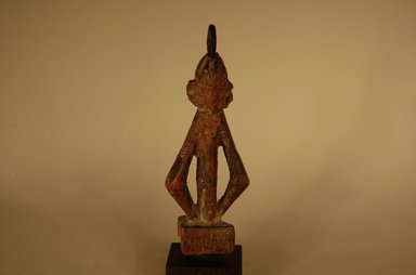 Dogon. <em>Figure</em>, early 20th century. Wood, metal, 5 7/8 x 2 5/16 x 7/8 in. (15 x 5.8 x 2.3 cm). Brooklyn Museum, Gift in memory of Frederic Zeller, 2014.54.17 (Photo: Brooklyn Museum, CUR.2014.54.17_view01.jpg)