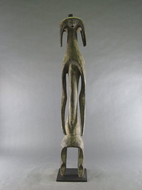 Mumuye. <em>Figure</em>, 20th century. Wood, 27 9/16 x 3 15/16 x 3 15/16 in. (70 x 10 x 10 cm). Brooklyn Museum, Gift in memory of Frederic Zeller, 2014.54.40 (Photo: Brooklyn Museum, CUR.2014.54.40_front.jpg)