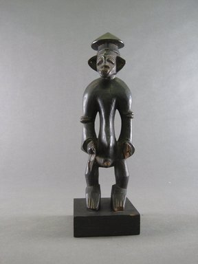 Senufo. <em>Figure of Male</em>, early 20th century. Wood, 8 1/16 x 2 3/8 x 2 3/8 in. (20.5 x 6 x 6 cm). Brooklyn Museum, Gift in memory of Frederic Zeller, 2014.54.43 (Photo: Brooklyn Museum, CUR.2014.54.43_front.jpg)