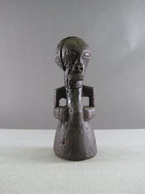 Songye. <em>Figure of Male</em>, 20th century. Wood, metal, organic materials (possibly palm oil), 7 5/16 x 2 3/4 x 2 3/4 in. (18.5 x 7 x 7 cm). Brooklyn Museum, Gift in memory of Frederic Zeller, 2014.54.47 (Photo: Brooklyn Museum, CUR.2014.54.47_front.jpg)