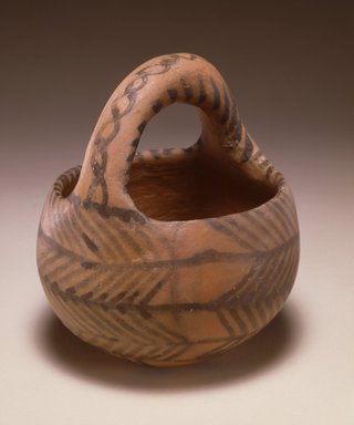  <em>Painted Cup with Basket Handle</em>, ca. 4500-3000 B.C.E. Ceramic, slip, height: 5 1/2 in. (14 cm). Brooklyn Museum, Gift of the Arthur M. Sackler Foundation, NYC, in memory of James F. Romano, 2015.65.27. Creative Commons-BY (Photo: Photograph courtesy of the Arthur M. Sackler Foundation, New York, CUR.2015.65.27_Sackler_Foundation_image.jpg)