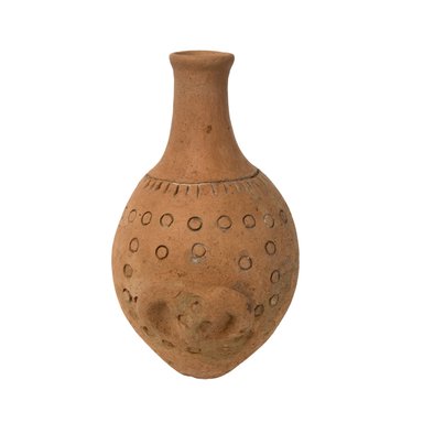  <em>Bottle with Ram or Buffalo Head</em>, 3rd-7th century C.E. Clay, height: 8 3/8 in. (21.3 cm). Brooklyn Museum, Gift of the Arthur M. Sackler Foundation, NYC, in memory of James F. Romano, 2015.65.4. Creative Commons-BY (Photo: Photograph courtesy of the Arthur M. Sackler Foundation, New York, CUR.2015.65.4_Sackler_Foundation_image.jpg)