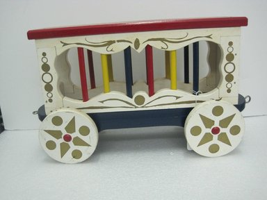 Frank Tilton (American, 1888-1957). <em>Animal Car, from Circus Train</em>, copyright 1953. Wood, pigment, metal, a: Car: 12 1/8 x 7 1/2 x 22 1/8 in. (30.8 x 19.1 x 56.2 cm). Brooklyn Museum, Purchased with funds given in honor of Henry Christensen III, 2016.6.4a-g. Creative Commons-BY (Photo: Brooklyn Museum, CUR.2016.6.4a.jpg)
