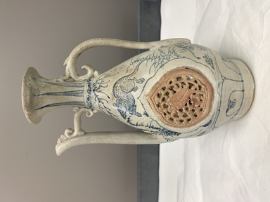  <em>Ewer</em>, 15th century. Porcelain, underglaze, height: 9 5/8 in. (24.5 cm). Brooklyn Museum, Gift of the Carroll Family Collection, 2022.38.1 (Photo: Image courtesy of the donors, Professor Ian R. Carroll, M.D. and Dr. Bonnie K. Dwyer, M.D., CUR.2022.38.1_view01.jpg)