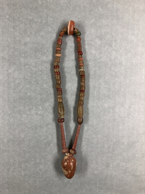  <em>Single Strand Necklace</em>. Breccia, carnelian, Length of necklace: 16 9/16 in. (42 cm). Brooklyn Museum, Gift of Charles M. Higgins, 21.441. Creative Commons-BY (Photo: , CUR.21.441_view01.jpg)