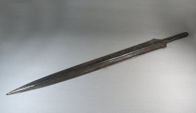  <em>Spear</em>. Iron, wood, 72 7/16 x 1 3/4 in. (184 x 4.5 cm). Brooklyn Museum, Museum Expedition 1922, Robert B. Woodward Memorial Fund, 22.1021. Creative Commons-BY (Photo: Brooklyn Museum, CUR.22.1021_threequarter_PS5.jpg)