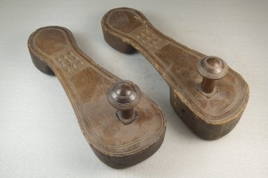 Swahili. <em>Pair of Clogs</em>, late 19th century. Wood, 3 3/4 x 3 1/8 x 10 1/5 in. (9.5 x 9.6 x 26.7 cm). Brooklyn Museum, Museum Expedition 1922, Robert B. Woodward Memorial Fund, 22.1044a-b. Creative Commons-BY (Photo: Brooklyn Museum, CUR.22.1044a-b_threequarter_PS5.jpg)