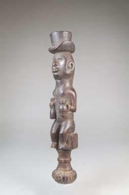 Vili. <em>Top of Whistle (Nsiba)</em>, late 19th or early 20th century. Wood, glass, lead, applied materials, 9 x 1 1/2 x 1 1/2 in. (22.9 x 3.8 x 3.8 cm). Brooklyn Museum, Museum Expedition 1922, Robert B. Woodward Memorial Fund, 22.104. Creative Commons-BY (Photo: Brooklyn Museum, CUR.22.104_threequarter_PS5.jpg)