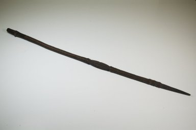  <em>Shaft, Wrapped with Wire</em>. Wood, copper, 33 7/8 x 1 3/16 in. (86 x 3 cm). Brooklyn Museum, Museum Expedition 1922, Robert B. Woodward Memorial Fund, 22.1055. Creative Commons-BY (Photo: Brooklyn Museum, CUR.22.1055_threequarter_PS5.jpg)