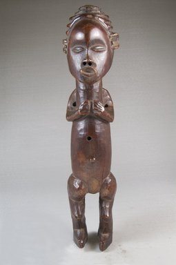 Possibly Suku. <em>Standing Figure</em>, 19th century. Wood, applied material, 11 1/2 x 2 1/2 x 2 1/4 in. (29.2 x 6.4 x 5.7 cm). Brooklyn Museum, Museum Expedition 1922, Robert B. Woodward Memorial Fund, 22.105. Creative Commons-BY (Photo: Brooklyn Museum, CUR.22.105_front_PS5.jpg)