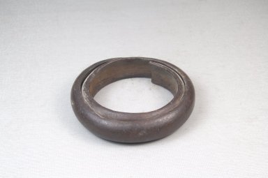  <em>Bracelet</em>. Carved wood, 3 1/8 x 11/16 in. (8 x 1.7 cm). Brooklyn Museum, Gift of Thomas A. Eddy, 22.1072. Creative Commons-BY (Photo: Brooklyn Museum, CUR.22.1072_front_PS5.jpg)