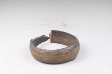  <em>Bracelet</em>. Carved wood, 2 9/16 x 11/16 in. (6.5 x 1.8 cm). Brooklyn Museum, Museum Expedition 1922, Robert B. Woodward Memorial Fund, 22.1073. Creative Commons-BY (Photo: Brooklyn Museum, CUR.22.1073_front_PS5.jpg)