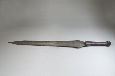  <em>Knife, Grooved</em>, 19th century. Iron, wood, 2 3/4 x 20 11/16 in. (7 x 52.5 cm). Brooklyn Museum, Museum Expedition 1922, Robert B. Woodward Memorial Fund, 22.1099. Creative Commons-BY (Photo: Brooklyn Museum, CUR.22.1099_side_PS5.jpg)
