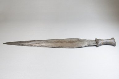 Boa. <em>Knife, Grooved</em>, late 19th or early 20th century. Iron, copper alloy, 2 3/8 x 19 7/16 in. (6 x 49.3 cm). Brooklyn Museum, Museum Expedition 1922, Robert B. Woodward Memorial Fund, 22.1106. Creative Commons-BY (Photo: Brooklyn Museum, CUR.22.1106_side_PS5.jpg)
