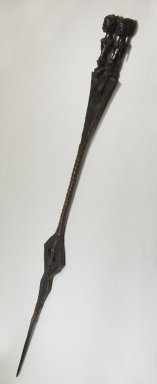Luba. <em>Staff of Office</em>, late 19th or early 20th century. Wood, sheet copper alloy, iron, oil, 51 3/8 x 4 1/4 x 2 in. (130.5 x 10.8 x 5.1 cm). Brooklyn Museum, Brooklyn Museum Collection, 22.1133. Creative Commons-BY (Photo: Brooklyn Museum, CUR.22.1133_threequarter_PS5.jpg)