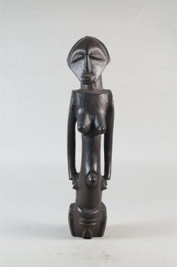 Possibly Luba. <em>Figure of a Standing Female</em>, late 19th or early 20th century. Wood, 9 5/8 x 5/16 in. (24.4 x 0.8 cm). Brooklyn Museum, Museum Expedition 1922, Robert B. Woodward Memorial Fund
, 22.114. Creative Commons-BY (Photo: Brooklyn Museum, CUR.22.114_front_PS5.jpg)