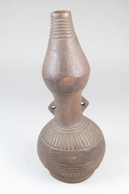 Kongo. <em>Bottle</em>, late 19th-early 20th century. Wood, 8 1/2 x 3 1/4 in. (21.6 x 8.3 cm). Brooklyn Museum, Museum Expedition 1922, Robert B. Woodward Memorial Fund, 22.123. Creative Commons-BY (Photo: Brooklyn Museum, CUR.22.123_front_PS5.jpg)