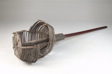  <em>Basket Rattle</em>, late 19th or early 20th century. Wood, reed, 14 1/2 x 3 1/2 in. (36.8 x 8.9 cm). Brooklyn Museum, Museum Expedition 1922, Robert B. Woodward Memorial Fund, 22.1276. Creative Commons-BY (Photo: Brooklyn Museum, CUR.22.1276_threequarter_PS5.jpg)