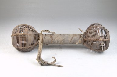 Chokwe. <em>Double Basket Rattle (Musambo)</em>, late 19th or early 20th century. Leather, rattan fiber, 8 1/4 x 2 1/2 in. (20.9 x 6.4 cm). Brooklyn Museum, Museum Expedition 1922, Robert B. Woodward Memorial Fund, 22.1278. Creative Commons-BY (Photo: Brooklyn Museum, CUR.22.1278_front_PS5.jpg)
