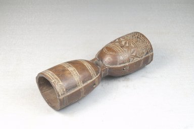  <em>Bell</em>, late 19th or early 20th century. Wood, 4 1/2 x 1 1/2 in. (11.4 x 3.8 cm). Brooklyn Museum, Museum Expedition 1922, Robert B. Woodward Memorial Fund, 22.1285. Creative Commons-BY (Photo: Brooklyn Museum, CUR.22.1285_threequarter_PS5.jpg)