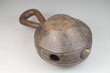 Kongo. <em>Bell with Handle</em>, late 19th or early 20th century. Wood, 7 x 3 1/2 in. (17.8 x 8.9 cm). Brooklyn Museum, Museum Expedition 1922, Robert B. Woodward Memorial Fund, 22.1308. Creative Commons-BY (Photo: Brooklyn Museum, CUR.22.1308_threequarter_PS5.jpg)