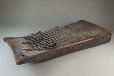  <em>Plucked Idiophone (Sanza)</em>, late 19th or early 20th century. Wood, metal, 2 3/4 x 15 3/4 x 7 in. (7 x 40 x 17.8 cm). Brooklyn Museum, Museum Expedition 1922, Robert B. Woodward Memorial Fund, 22.1310. Creative Commons-BY (Photo: Brooklyn Museum, CUR.22.1310_threequarter_PS5.jpg)