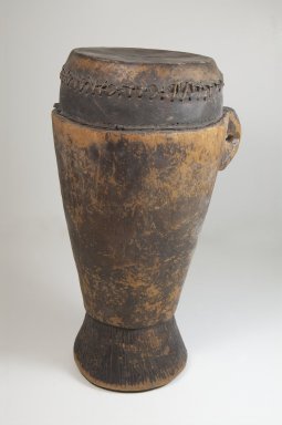  <em>Drum</em>, late 19th or early 20th century. Wood, leather, fiber, 14 1/2 x 6 1/8 in. (36.8 x 15.5 cm). Brooklyn Museum, Museum Expedition 1922, Robert B. Woodward Memorial Fund, 22.1330. Creative Commons-BY (Photo: Brooklyn Museum, CUR.22.1330_front_PS5.jpg)