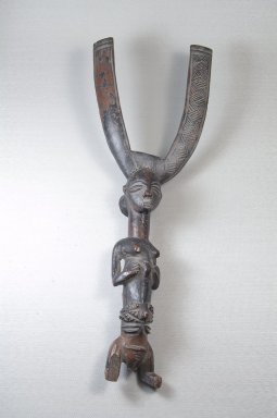 Luba. <em>Bow Stand (Nsakakabemba)</em>, late 19th or early 20th century. Wood, 15 1/4 x 5 1/2 x 2 3/4 in. (38.7 x 14 x 7 cm). Brooklyn Museum, Museum Expedition 1922, Robert B. Woodward Memorial Fund, 22.1347. Creative Commons-BY (Photo: Brooklyn Museum, CUR.22.1347_front_PS5.jpg)