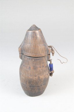 Kamba Kongo. <em>Powder Box (Tutukipfula)</em>, late 19th–early 20th century. Wood, fiber, plastic beads, copper alloy, height: 5 in. (12.7 cm); diameter: 2 1/2 in. (6.4 cm). Brooklyn Museum, Museum Expedition 1922, Robert B. Woodward Memorial Fund, 22.138. Creative Commons-BY (Photo: Brooklyn Museum, CUR.22.138_front_PS5.jpg)