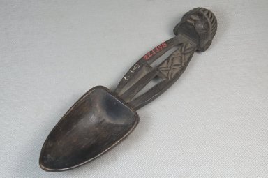 Possibly Togbo. <em>Spoon</em>, late 19th-early 20th century. Wood, 2 x 8 in. (5.1 x 20.3 cm). Brooklyn Museum, Museum Expedition 1922, Robert B. Woodward Memorial Fund, 22.1398. Creative Commons-BY (Photo: Brooklyn Museum, CUR.22.1398_threequarter_PS5.jpg)
