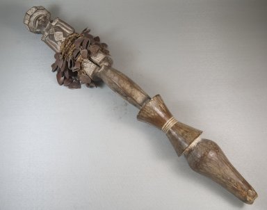 Yombe. <em>Rattle with Male Figure</em>, before 1922. Wood, fiber, shells, 11 7/16 x 2 3/4 in. (29 x 7 cm). Brooklyn Museum, Museum Expedition 1922, Robert B. Woodward Memorial Fund, 22.1422. Creative Commons-BY (Photo: Brooklyn Museum, CUR.22.1422_threequarter_PS5.jpg)