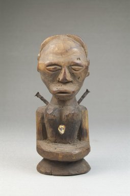 Songye. <em>Half Figure</em>, late 19th or early 20th century. Wood, iron, tooth, 5 1/4 x 2 1/4 x 2 in. (13.3 x 5.7 x 5.1 cm). Brooklyn Museum, Museum Expedition 1922, Robert B. Woodward Memorial Fund, 22.1433. Creative Commons-BY (Photo: Brooklyn Museum, CUR.22.1433_front_PS5.jpg)